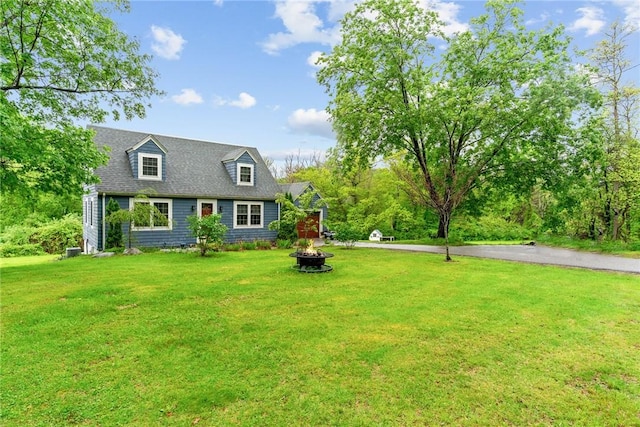 223 Chopmist Hill Rd, Glocester, RI 02814 - cape cod-style house with an outdoor fire pit and a front yard