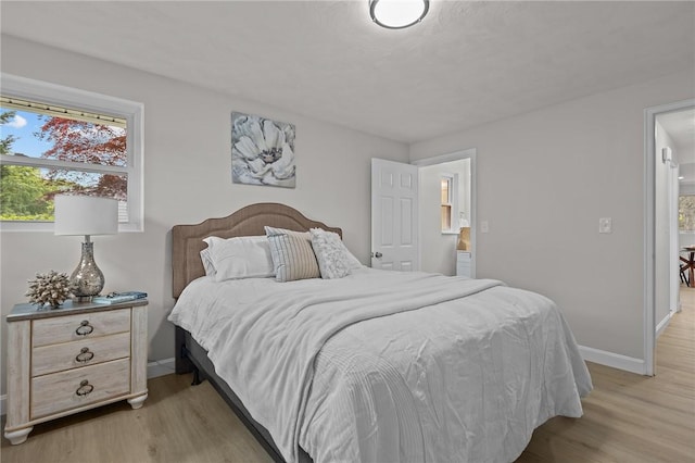 120 Aspinet Dr, Warwick, RI 02888 - bedroom featuring light wood-type flooring and baseboards