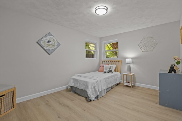 120 Aspinet Dr, Warwick, RI 02888 - bedroom with wood finished floors and baseboards