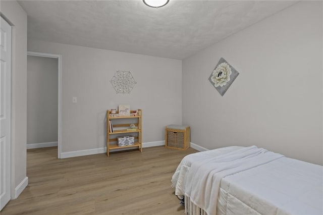 120 Aspinet Dr, Warwick, RI 02888 - bedroom with light wood finished floors and baseboards