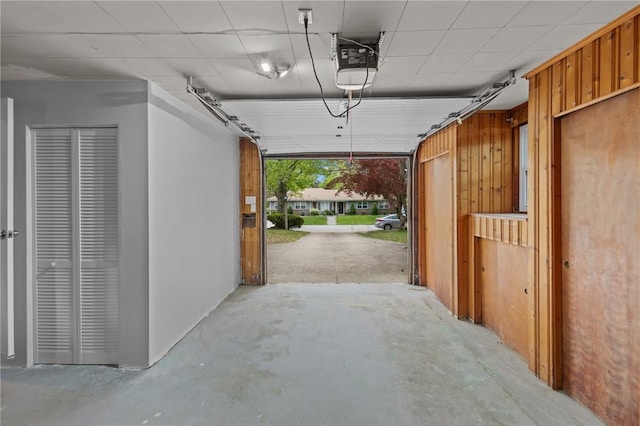 120 Aspinet Dr, Warwick, RI 02888 - garage featuring a garage door opener