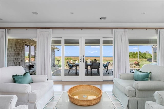 61 Baileys Ledge Rd, Little Compton, RI 02837 - living room featuring french doors and wood finished floors