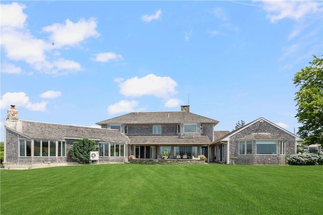 61 Baileys Ledge Rd, Little Compton, RI 02837 - back of house with a yard and a chimney