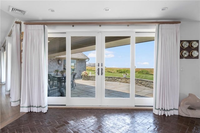 61 Baileys Ledge Rd, Little Compton, RI 02837 - doorway with french doors and brick patterned floors