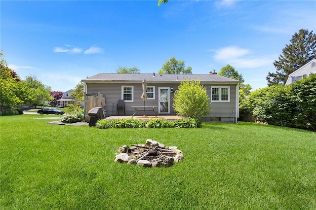 25 Old Pine Rd, Narragansett, RI 02882 - back of property with a yard, a fire pit, and a patio