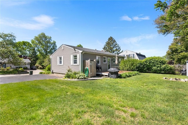 25 Old Pine Rd, Narragansett, RI 02882 - back of house with a lawn