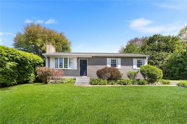 25 Old Pine Rd, Narragansett, RI 02882 - view of front of home featuring a chimney and a front lawn