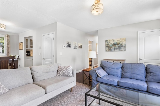 25 Old Pine Rd, Narragansett, RI 02882 - living area with baseboards and a textured ceiling