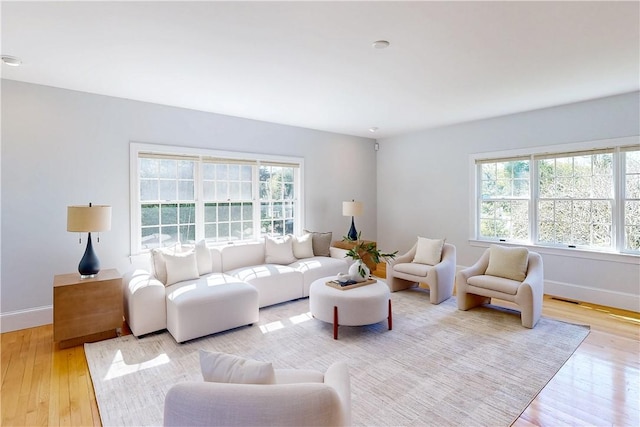 38 Westwind Dr, Jamestown, RI 02835 - living room with light wood-style flooring and baseboards