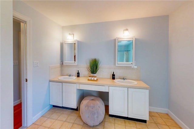 38 Westwind Dr, Jamestown, RI 02835 - bathroom featuring tasteful backsplash, double vanity, and baseboards