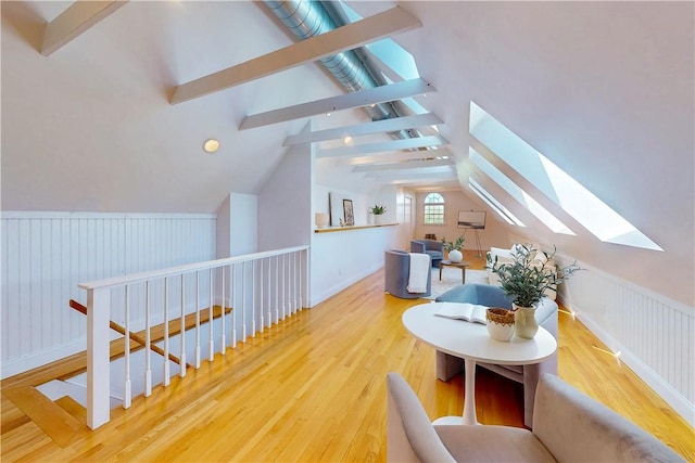 38 Westwind Dr, Jamestown, RI 02835 - additional living space with a skylight, wood finished floors, and wainscoting