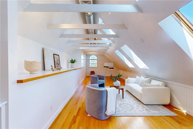 38 Westwind Dr, Jamestown, RI 02835 - living room featuring a skylight and wood finished floors