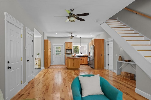 888 Plainfield Pike, Coventry, RI 02827 - entrance foyer featuring a ceiling fan, stairway, light wood-style floors, recessed lighting, and baseboards