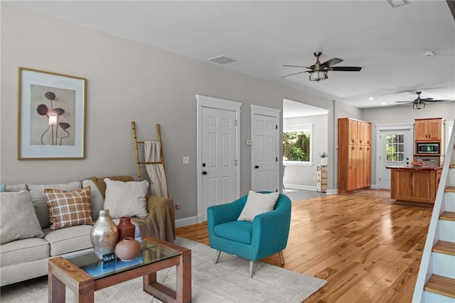 888 Plainfield Pike, Coventry, RI 02827 - living area featuring light wood finished floors, a ceiling fan, baseboards, and recessed lighting