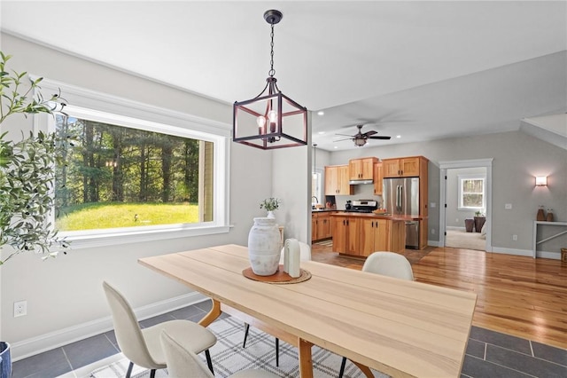 888 Plainfield Pike, Coventry, RI 02827 - tiled dining space featuring baseboards, a sink, a chandelier, a ceiling fan, and recessed lighting