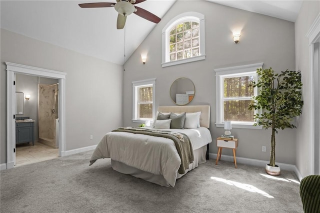 888 Plainfield Pike, Coventry, RI 02827 - bedroom featuring light colored carpet, multiple windows, ensuite bath, baseboards, and high vaulted ceiling