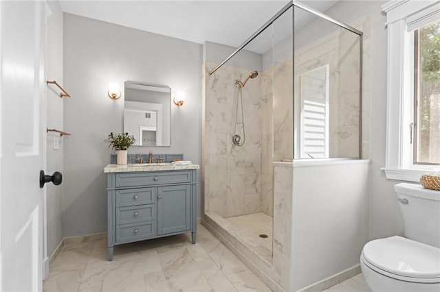 888 Plainfield Pike, Coventry, RI 02827 - bathroom featuring a stall shower, toilet, vanity, baseboards, and marble finish floors