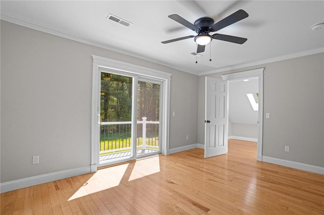 888 Plainfield Pike, Coventry, RI 02827 - spare room with crown molding, light wood-style floors, baseboards, and ceiling fan