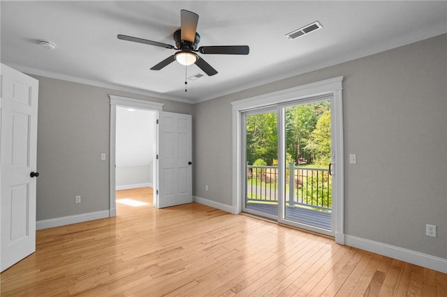 888 Plainfield Pike, Coventry, RI 02827 - spare room with light wood-style floors, baseboards, ceiling fan, and crown molding