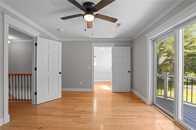 888 Plainfield Pike, Coventry, RI 02827 - unfurnished room with light wood finished floors, baseboards, ceiling fan, and ornamental molding