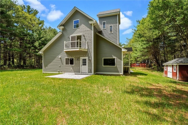 888 Plainfield Pike, Coventry, RI 02827 - rear view of property with a balcony, a patio, and a yard