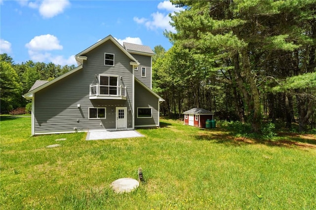 888 Plainfield Pike, Coventry, RI 02827 - back of property with a patio and a yard