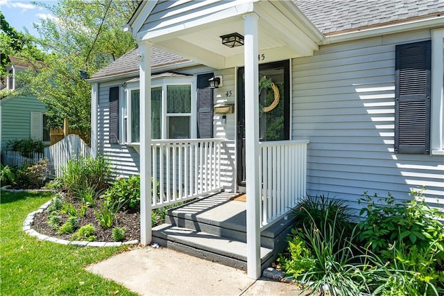 45 Nichols Rd, North Kingstown, RI 02852 - property entrance with a shingled roof
