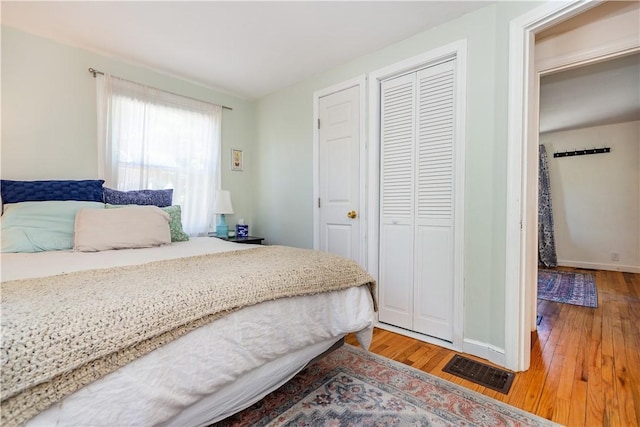45 Nichols Rd, North Kingstown, RI 02852 - bedroom featuring wood finished floors, a closet, and baseboards