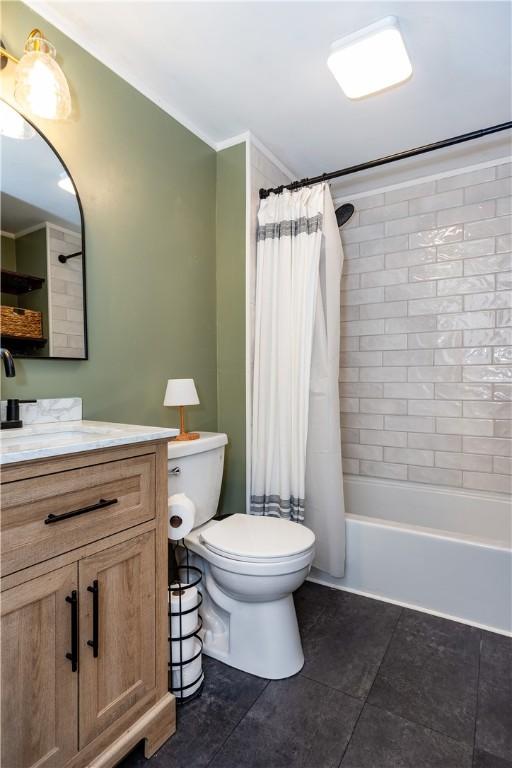 45 Nichols Rd, North Kingstown, RI 02852 - bathroom featuring tile patterned floors, toilet, vanity, and shower / bath combination with curtain