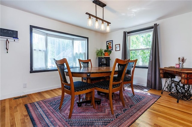 45 Nichols Rd, North Kingstown, RI 02852 - dining space featuring wood finished floors and baseboards