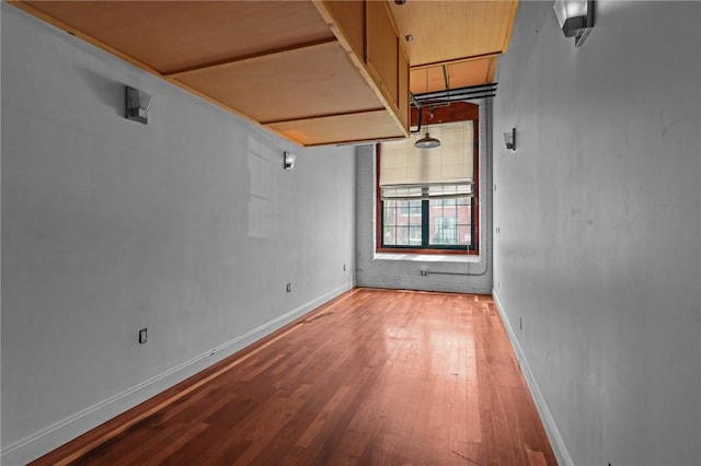 1117 Douglas Ave Unit 120, North Providence, RI 02904 - unfurnished room featuring wood finished floors and baseboards