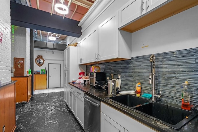 1117 Douglas Ave Unit 120, North Providence, RI 02904 - kitchen featuring a sink, dark marble finish flooring, stainless steel dishwasher, backsplash, and white cabinetry