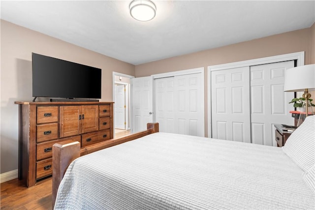 37 Boundary Ave, Providence, RI 02909 - bedroom with multiple closets, wood finished floors, and baseboards