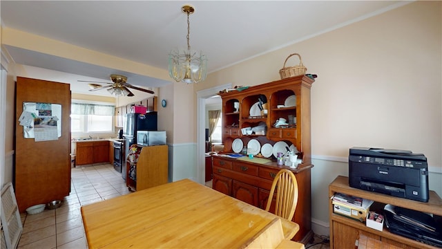 49 Nathaniel Ave, Pawtucket, RI 02860 - dining room with a chandelier, light tile patterned flooring, and a ceiling fan