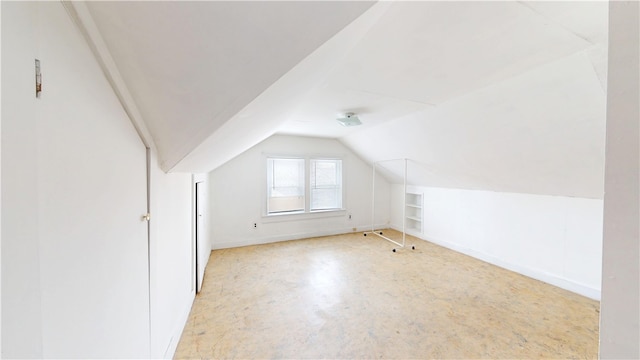 49 Nathaniel Ave, Pawtucket, RI 02860 - additional living space with vaulted ceiling, built in shelves, and baseboards