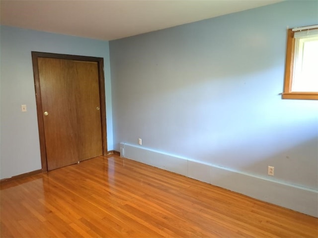 13 Ivy Pl, Lincoln, RI 02865 - unfurnished bedroom with light wood-style flooring and a closet