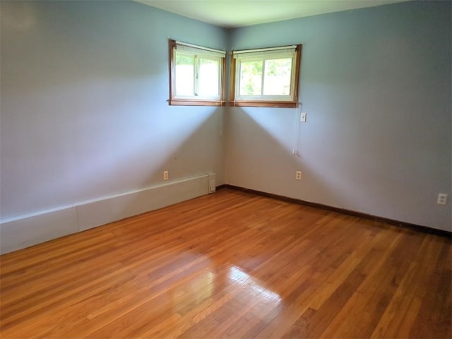 13 Ivy Pl, Lincoln, RI 02865 - empty room featuring light wood-style floors and baseboards