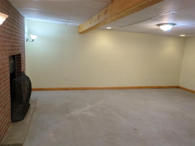 13 Ivy Pl, Lincoln, RI 02865 - finished below grade area with a paneled ceiling, baseboards, and a brick fireplace