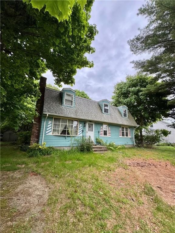 74 Cedar Rd, Charlestown, RI 02813 - cape cod-style house featuring a chimney and roof with shingles