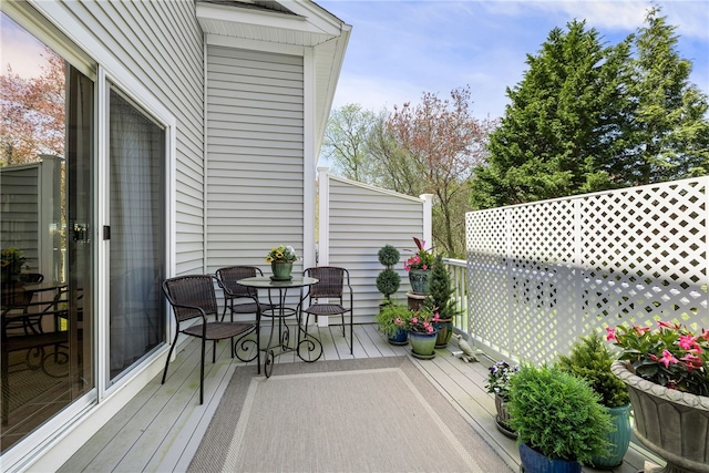 83 Preservation Way S, Kingstown, RI 02879 - wooden deck featuring outdoor dining area