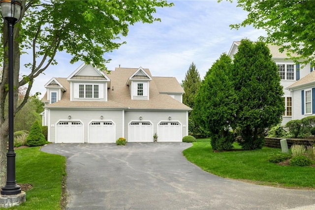 83 Preservation Way S, Kingstown, RI 02879 - view of front of property with a garage, asphalt driveway, and a front lawn