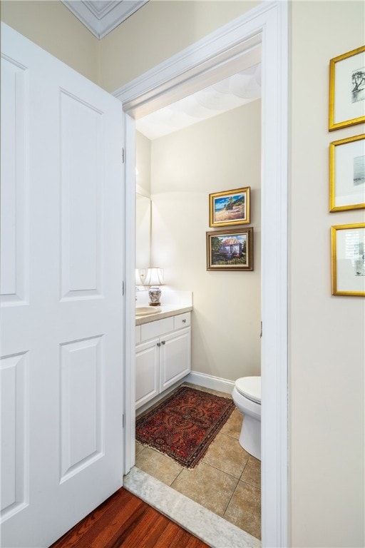 83 Preservation Way S, Kingstown, RI 02879 - bathroom featuring toilet, vanity, tile patterned floors, and baseboards