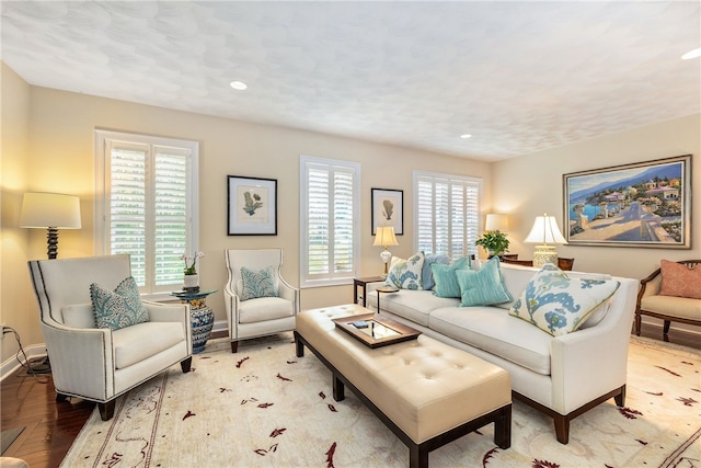 83 Preservation Way S, Kingstown, RI 02879 - living room featuring baseboards, wood finished floors, and recessed lighting