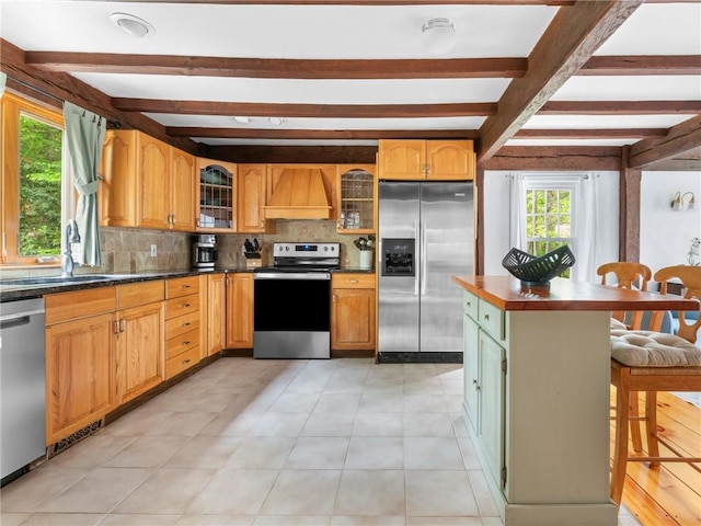 12 Rustic Acres Dr, Glocester, RI 02814 - kitchen with stainless steel appliances, premium range hood, dark countertops, tasteful backsplash, and beamed ceiling