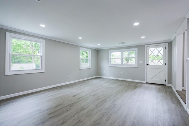31 Forbes St, East Providence, RI 02915 - unfurnished room with ornamental molding, baseboards, wood finished floors, and recessed lighting