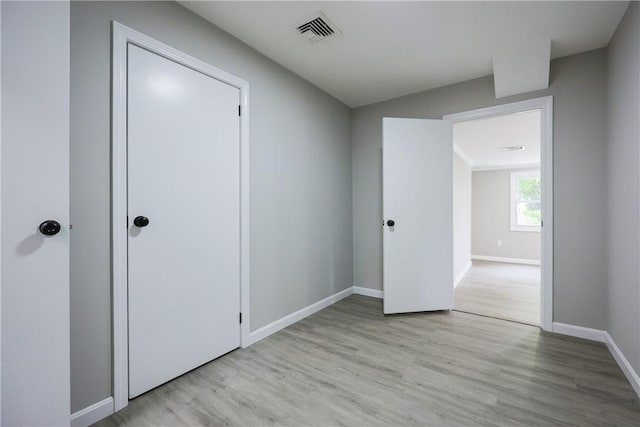 31 Forbes St, East Providence, RI 02915 - unfurnished bedroom featuring light wood-style flooring and baseboards