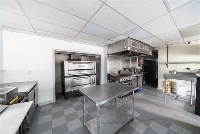 1 Spring St, Hopkinton, RI 02832 - kitchen with a drop ceiling, tile patterned floors, and baseboards