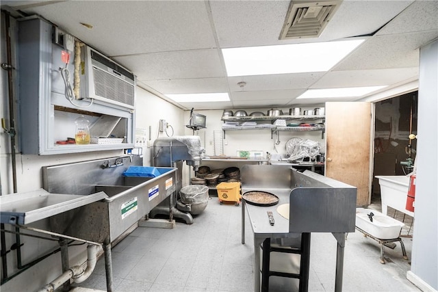 1 Spring St, Hopkinton, RI 02832 - miscellaneous room featuring a paneled ceiling, tile patterned floors, and a wall mounted AC