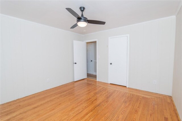 70 Enfield Ave, Providence, RI 02908 - unfurnished room with wood finished floors, ceiling fan, and ornamental molding