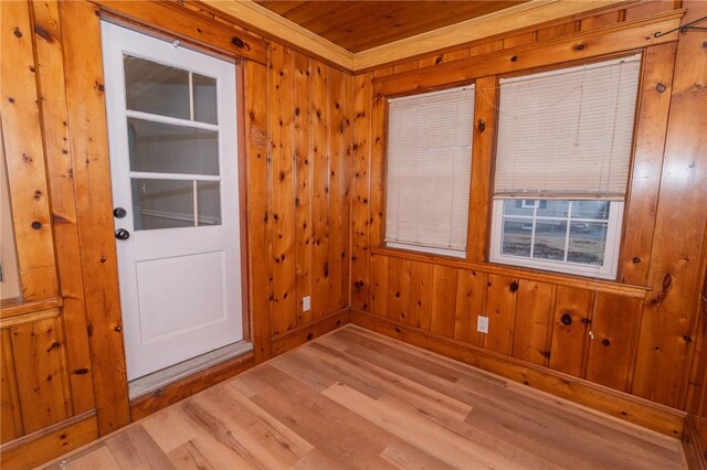 70 Enfield Ave, Providence, RI 02908 - empty room with wood walls, wood finished floors, wood ceiling, and ornamental molding
